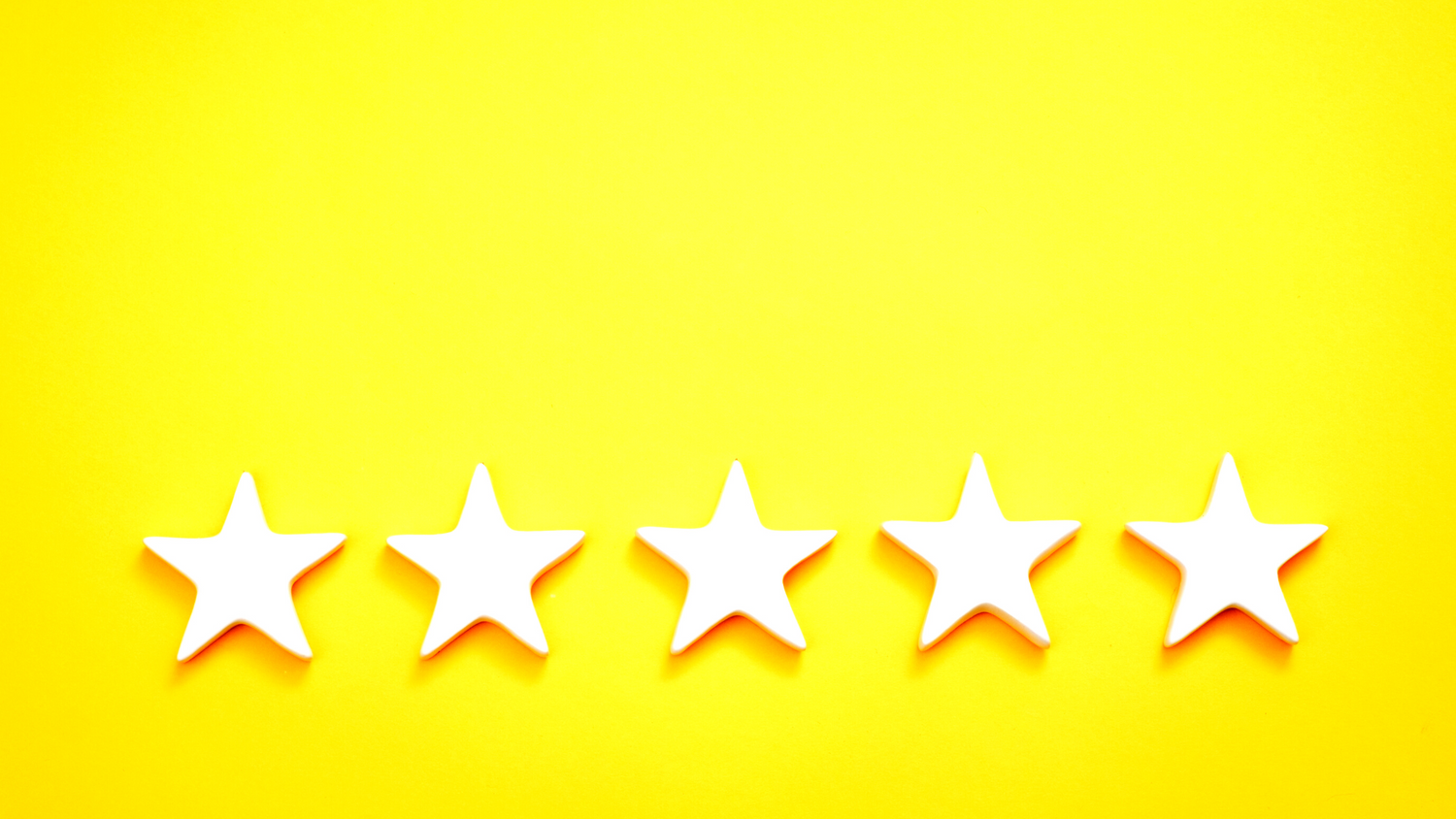 five stars over yellow background